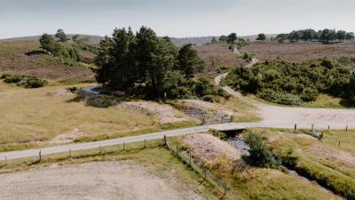 Aerial view of singletrack road crossing Slugain burn.