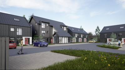 Image shows design of a new housing development, with driveways in the foreground and a number of people walking on the street.